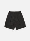 The Black Recycled Polytech Pleated Track Short is shown as a flat lay against a white background. The shorts feature an elasticated waistband with belt loops, a single pleat on each leg, and two side pockets. The fabric is a smooth, matte black recycled polytech material.