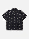 The Black Embroidered Diamond Camp Shirt is shown from the back as a flat lay against a plain white background. The shirt features a short-sleeve construction, a straight hem, and an all-over embroidered diamond pattern.