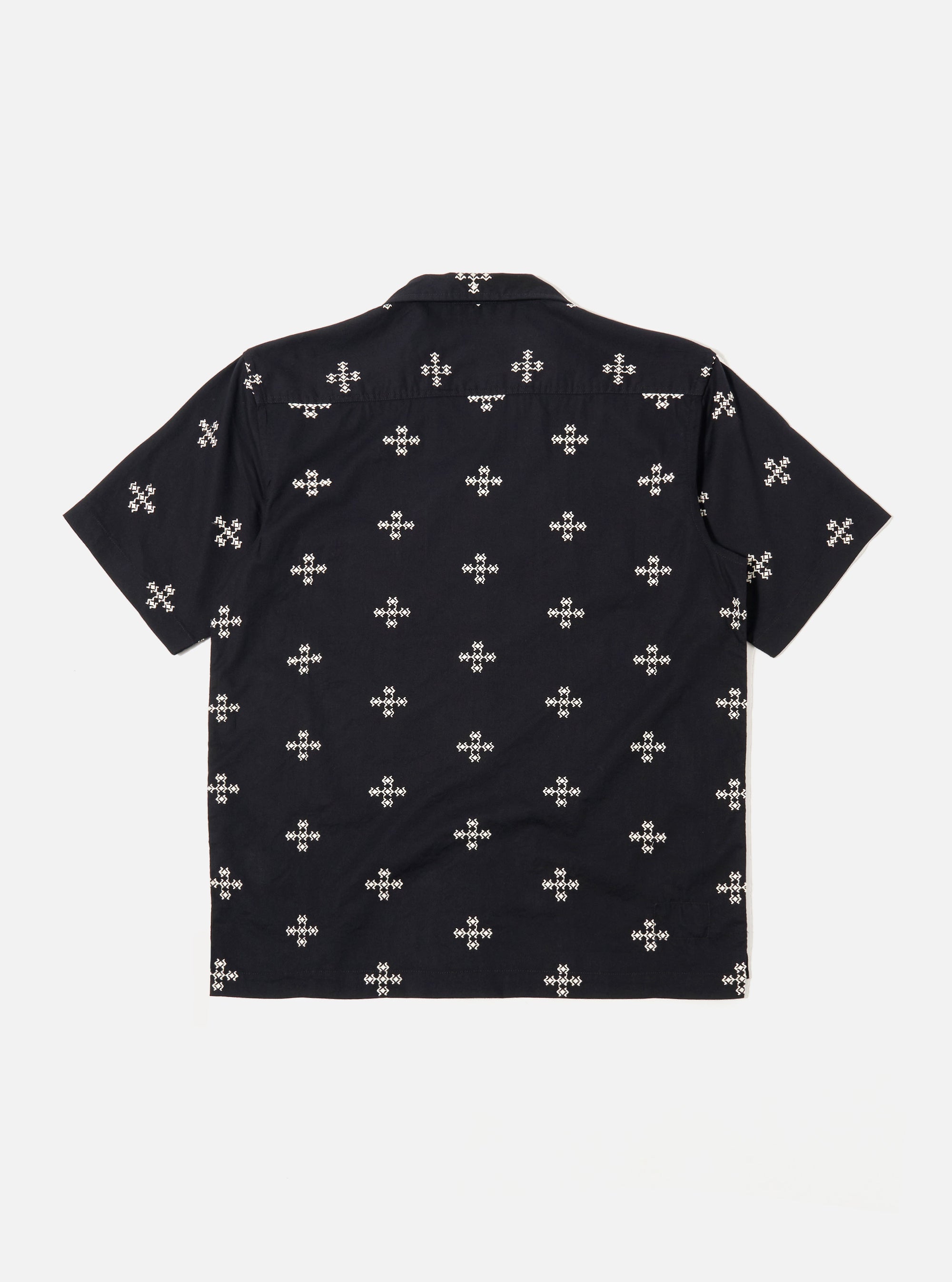 The Black Embroidered Diamond Camp Shirt is shown from the back as a flat lay against a plain white background. The shirt features a short-sleeve construction, a straight hem, and an all-over embroidered diamond pattern.