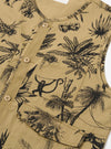 The Sand Jungle Toile Twill 4 Pocket Gilet is shown from the back against a plain white background. The gilet features a loose, relaxed fit with a straight hem and a simple neckline. The fabric is a sand-colored twill featuring a tonal jungle toile print throughout.