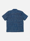 The Indigo Block Print Circles Camper Shirt is shown from the back as a flat lay against a plain white background. The shirt features an all-over pattern of white circular block prints on a dark indigo base, a horizontal back yoke, and a straight hem.