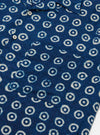 The Indigo Block Print Circles Camper Shirt is shown from the back as a flat lay against a plain white background. The shirt features an all-over hand-printed pattern of white concentric circles on a deep indigo blue base. The image highlights the straight hem, short sleeves, and the continuous pattern across the back panel.