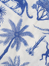 A close-up fabric swatch of the White Jungle Toile Poplin Fatigue Shirt highlights the intricate jungle toile print on white cotton poplin. The design features various animals and tropical foliage illustrations in a dark shade.