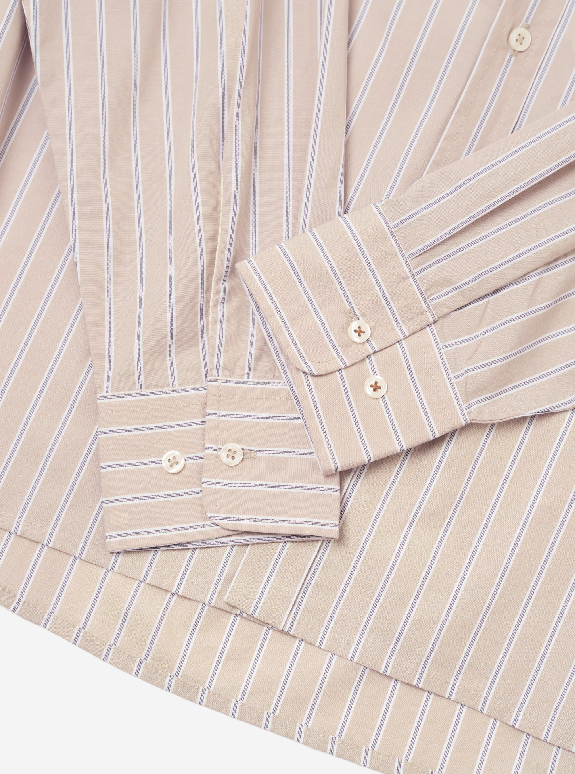 The Sand Urban Stripe Lazy Day Shirt is shown from the back as a flat lay against a plain white background. The image highlights the horizontal stripe pattern, the back yoke, and the central box pleat.