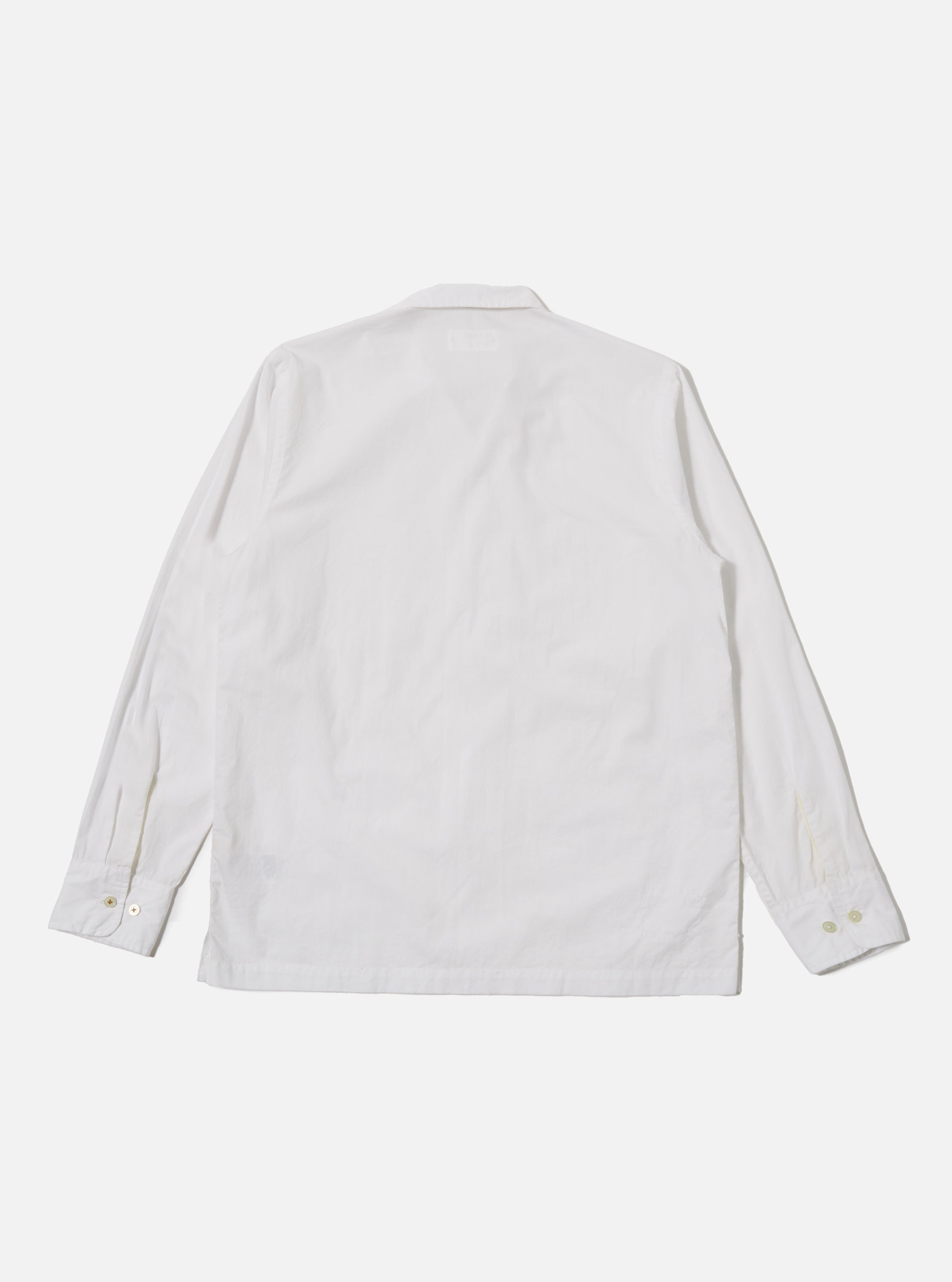 The White Poplin Dwight Overshirt is shown from the back as a flat lay against a plain white background. The image highlights the straight hem, the smooth cotton poplin fabric, and the clean stitching across the shoulders.