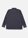 The Navy Poplin Dwight Overshirt is presented from the back as a flat lay against a plain white background. The image highlights the straight hem, the rear of the Cuban collar, and the smooth texture of the navy blue cotton poplin fabric.