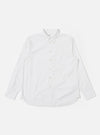 The White Poplin Patched Lazy Day Shirt is shown as a flat lay against a plain white background. The shirt features a relaxed fit, a simple pointed collar, and a central button-down front. A prominent design element is the single asymmetric chest pocket. The fabric is a crisp, solid white cotton poplin.