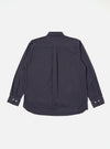The Navy Poplin Patched Lazy Day Shirt is shown from the back as a flat lay against a plain white background. The image highlights the shirt's relaxed construction and tonal paneling, featuring a clean back yoke and the smooth texture of the navy poplin cotton.
