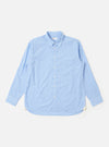 The Sky Fil A Fil Square Pocket Shirt is shown as a flat lay against a white background. The shirt features a button-down front, a classic collar, and a large oversized square chest pocket on the left side. The fabric has a fine sky blue and white fil-a-fil weave.