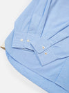 The Sky Fil A Fil Square Pocket Shirt is shown from the back as a flat lay against a white background. The shirt features a prominent back yoke and a simple, clean design highlighting the light blue end-on-end fabric texture. It has long sleeves and a curved hem.