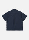 The Navy Recycled Polytech Z Tech Overshirt is shown from the back as a flat lay against a plain white background. The image highlights the clean, straight-cut back panel and the smooth finish of the navy blue recycled polytech fabric.