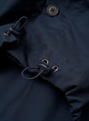 The Navy Recycled Polytech Z Tech Overshirt is shown from a rear angle as a flat lay against a plain white background. The image highlights the short-sleeve design, the clean finish of the navy fabric, and a back yoke with a central box pleat.