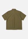 The Olive Recycled Polytech Z Tech Overshirt is shown from the back as a flat lay against a plain white background. The image highlights the clean, straight-cut rear panel of the garment, featuring a simple horizontal yoke across the shoulders and a straight hem. The olive green recycled polytech fabric has a smooth, technical finish.
