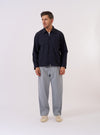 The Navy Seo Recycled Nylon Zip Too Shirt is shown as a flat lay against a plain white background. The shirt features a full-length central zip closure, a classic collar, and two large patch pockets on the chest. The fabric is a smooth navy blue recycled nylon with a slight technical sheen.