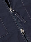 The Navy Seo Recycled Nylon Zip Too Shirt is shown in a detail view as a flat lay against a plain white background. The image highlights the technical texture of the dark navy recycled nylon fabric, focusing on the construction of the chest pockets and the silver-tone metal zipper.