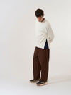 The Ecru Brush Back Sweat Billy Sweat is shown as a flat lay against a plain white background. The sweatshirt features a ribbed crew neckline, long sleeves with ribbed cuffs, and a ribbed hem. The garment is made from a solid ecru-colored brush back sweat fabric.
