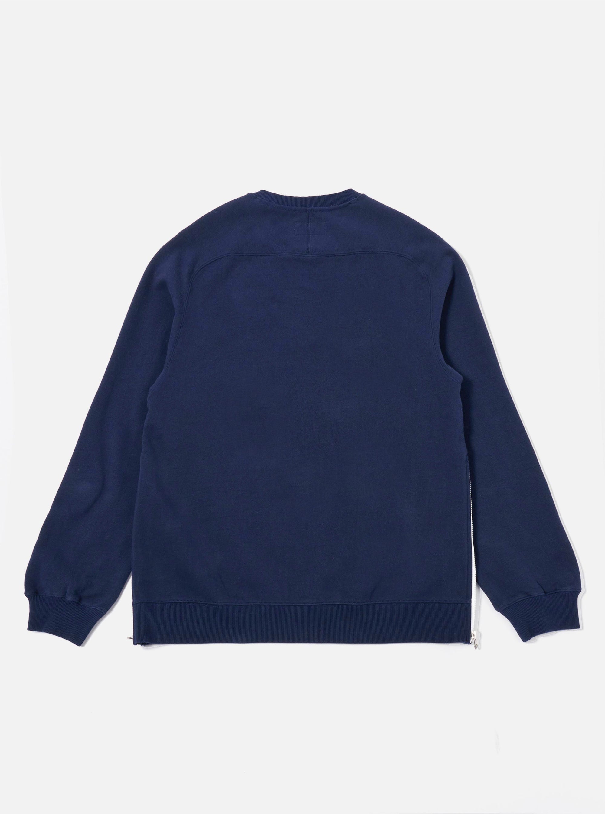 The Navy Brush Back Sweat Billy Sweat is shown as a flat lay from the back against a plain white background. The image highlights the rear of the sweatshirt, including the ribbed hem and cuffs, as well as the stitching detail at the shoulders.