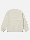 The Ecru Brush Back Sweat Billy Sweat is shown from the back as a flat lay against a plain white background. The sweatshirt features a crew neckline, long sleeves with ribbed cuffs, and a ribbed hem. The fabric is a solid ecru color with a soft, textured appearance.