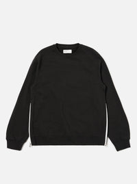 The Black Brush Back Sweat Billy Sweat is shown as a flat lay against a plain white background. The sweatshirt features a classic crew neckline, long sleeves with ribbed cuffs, and a ribbed hem. The garment is made from a solid black cotton fabric with a soft, brushed texture.