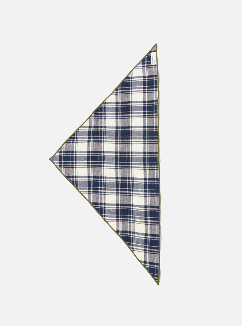 The Navy Texture Plaid Scout Scarf is displayed as a flat lay against a plain white background. The scarf features a dark navy blue base with a textured plaid pattern and frayed edges.