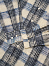 The Navy Window Panes Square Pocket Shirt is shown from the back as a flat lay against a plain white background. The image highlights the shirt's deep navy blue color and the white windowpane check pattern. The construction details visible include a straight hem, a simple one-piece back panel, and a structured collar.