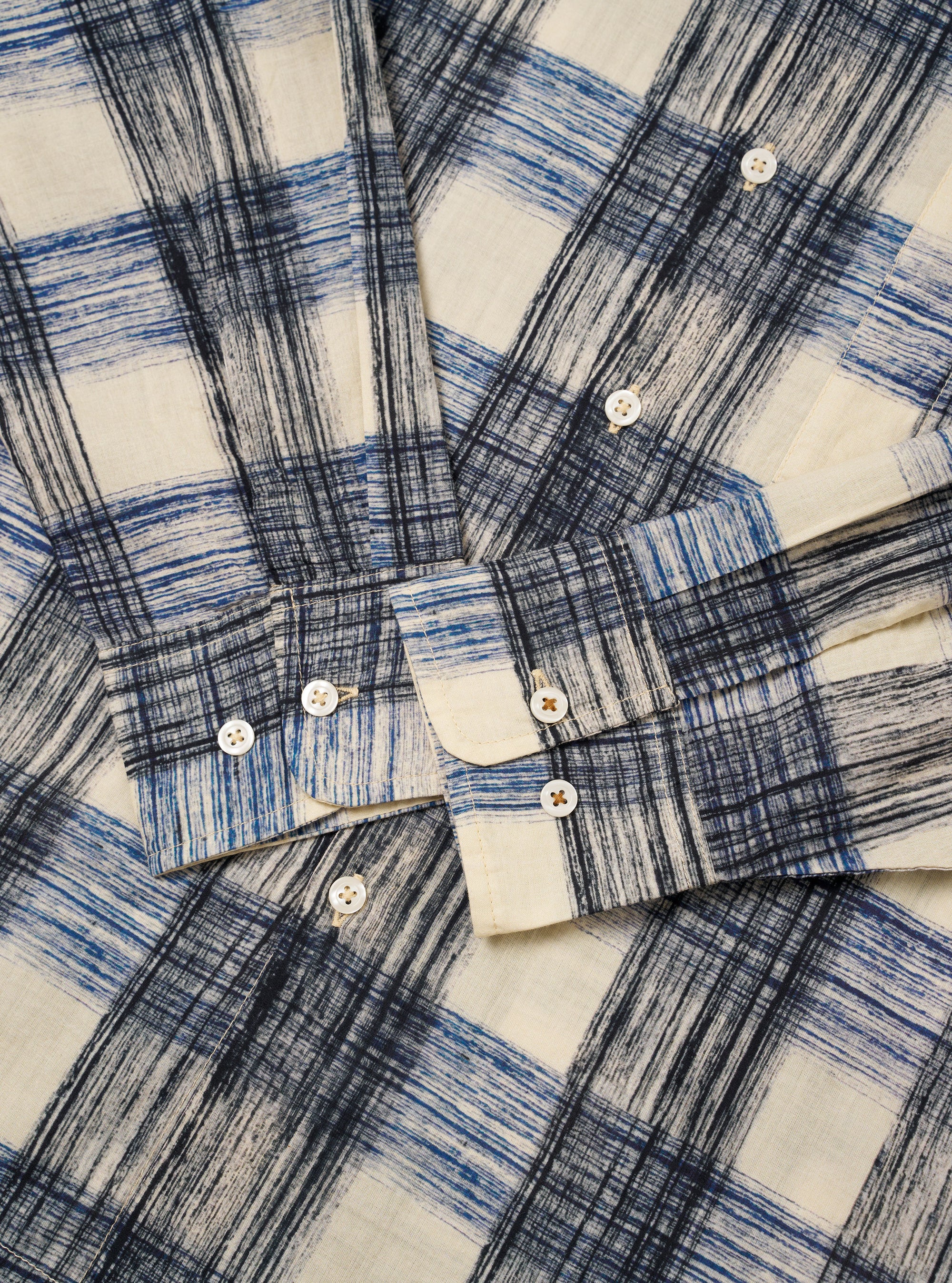 The Navy Window Panes Square Pocket Shirt is shown from the back as a flat lay against a plain white background. The image highlights the shirt's deep navy blue color and the white windowpane check pattern. The construction details visible include a straight hem, a simple one-piece back panel, and a structured collar.