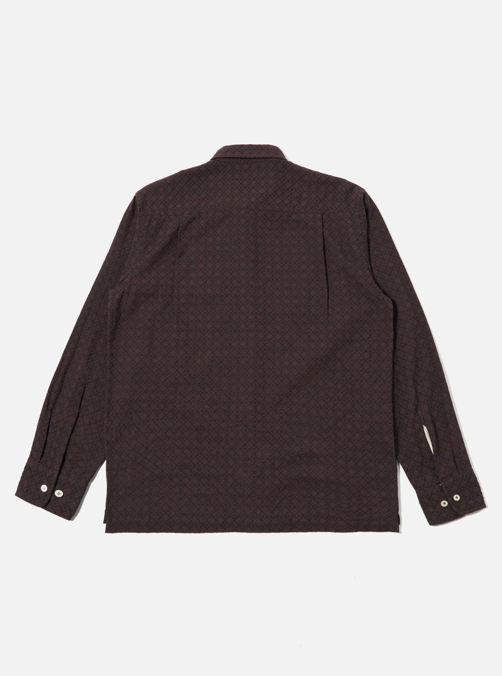The Brown Diamond Dobby Lucky Shirt is shown from the back as a flat lay against a plain white background. The image highlights the shirt's relaxed fit, straight hem, and the distinct textured diamond dobby weave of the brown cotton fabric.