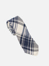 The Navy Texture Plaid Tie is shown as a flat lay against a plain white background. The tie features a classic pointed tip and is made from a lightweight cotton gauze fabric with a textured, bold plaid pattern in shades of navy blue.