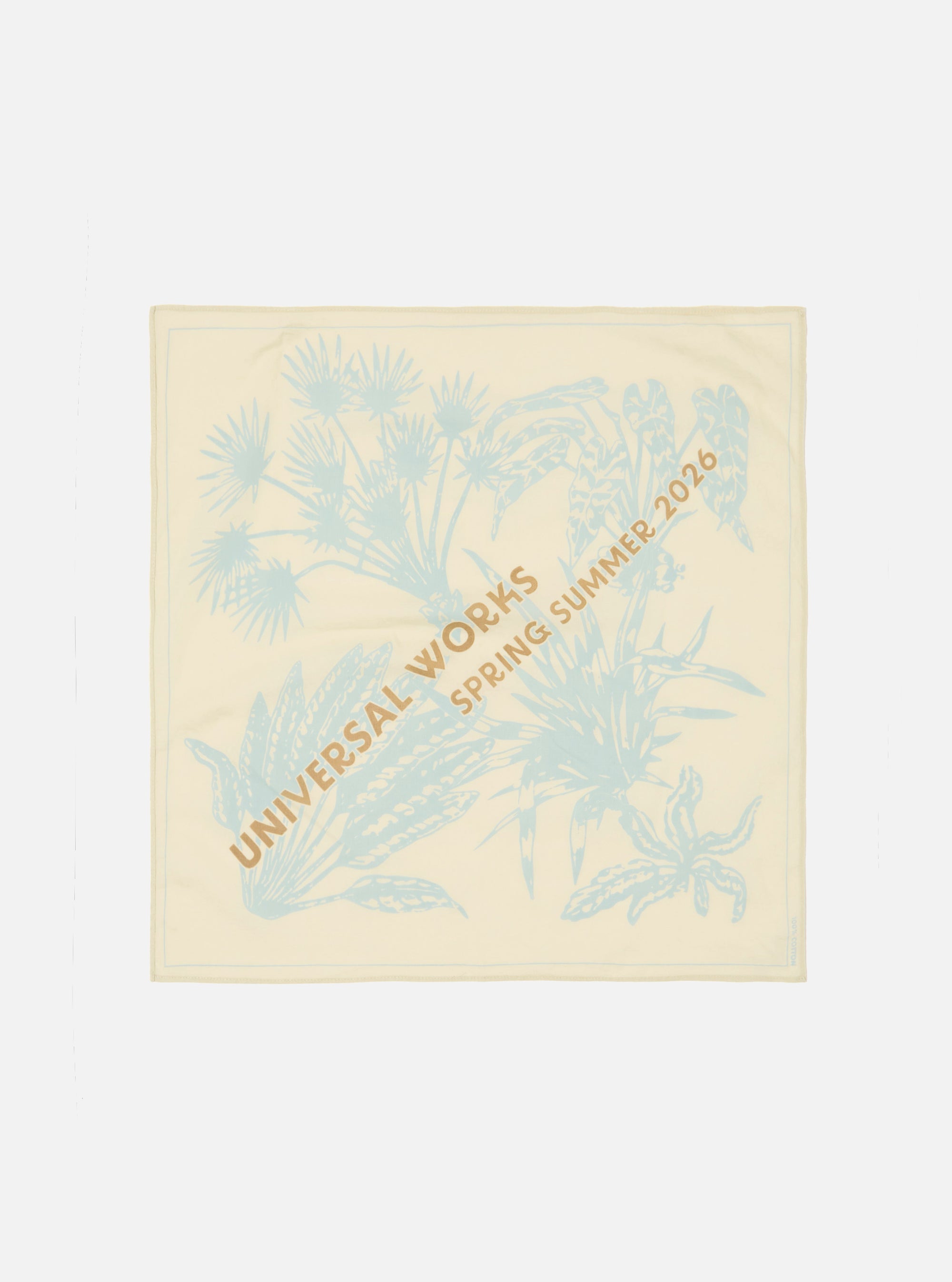The Cream Cambric Neckerchief is displayed as a flat lay against a plain white background. The square accessory features an exclusive dark-colored graphic print across the cream cotton fabric.