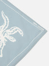 The Pale Blue Cambric Neckerchief is shown as a flat lay against a plain white background. The image highlights the lightweight, pale blue cotton fabric and its clean, finished edges.
