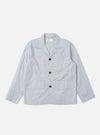 The Navy Kennedy Stripe Franck Jacket is shown as a flat lay against a white background. The jacket features a distinct vertical white stripe pattern on a navy blue cotton fabric. It has a three-button front closure, a structured collar with lapels, and two large patch pockets at the waist.