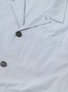 The Navy Kennedy Stripe Franck Jacket is shown from the back as a flat lay against a plain white background. The image highlights the vertical pinstripe pattern on the navy cotton fabric, a straight hem, and the clean construction of the shoulders and sleeves.