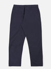 The Navy Peached Poplin Military Chino is shown as a flat lay against a plain white background. The trousers feature a mid-rise waistband with belt loops, two side pockets, and a tapered leg. The fabric is a solid navy blue cotton with a smooth, peached texture.