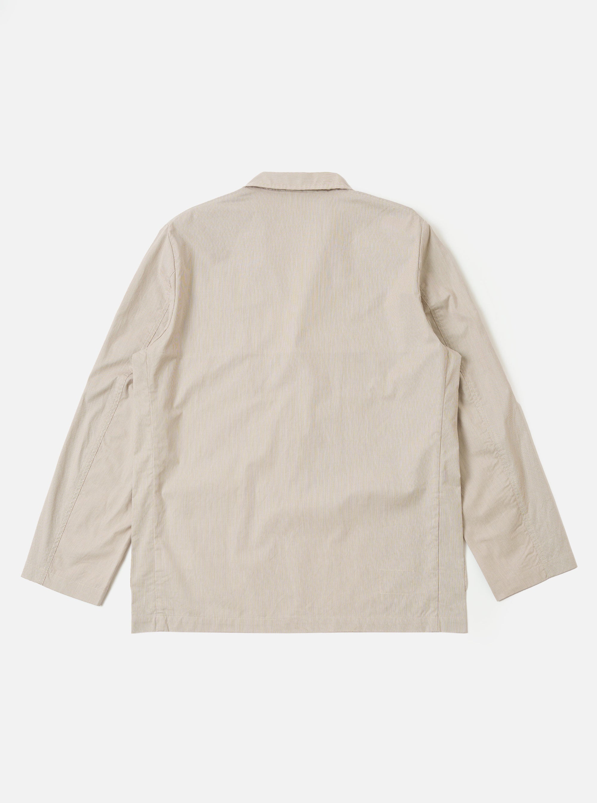 The Brown Kennedy Stripe Three Button Jacket is shown from the back as a flat lay against a plain white background. The image highlights the jacket's unstructured design, straight hem, and the subtle vertical Kennedy stripe pattern in brown.