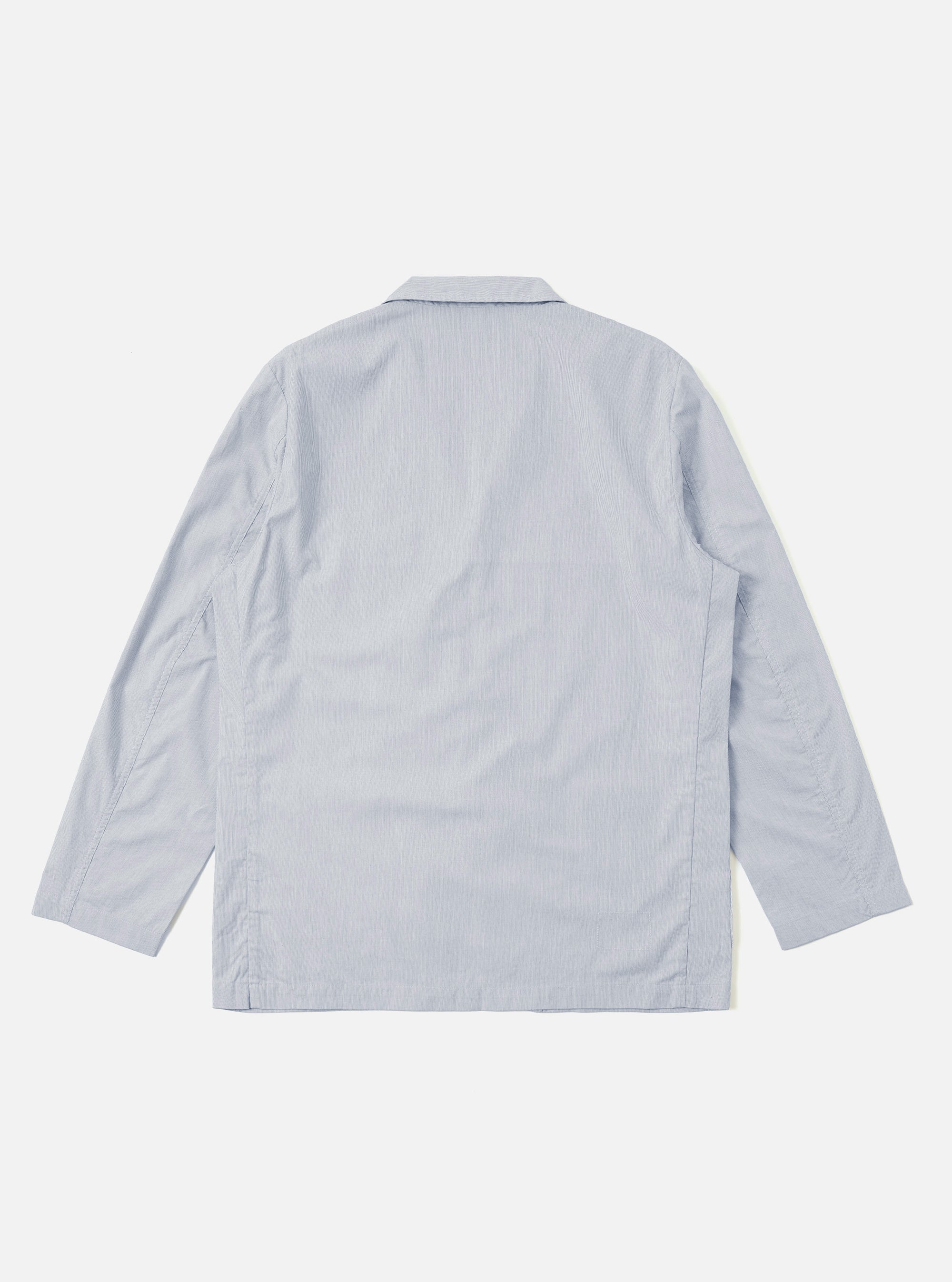 The Navy Kennedy Stripe Three Button Jacket is shown from the back as a flat lay against a plain white background. The image highlights the fine white vertical pinstripes on the navy blue cotton fabric, as well as the jacket's structured shoulders and central back seam.