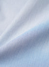 A close-up swatch image of the Navy Kennedy Stripe Three Button Jacket fabric highlights the fine vertical white stripes against a deep navy blue background. The texture of the cotton material is clearly visible, showcasing the clean lines of the pattern.