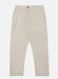 The Brown Kennedy Stripe Military Chino is presented as a flat lay against a plain white background. The trousers feature a vertical striped pattern in shades of brown and tan, with a button fly, belt loops, and two front slant pockets visible. The garment has a straight-leg cut and a clean, structured appearance.