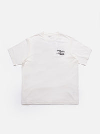The Ecru Love Football Jersey Print Tee is shown as a flat lay against a plain white background. The t-shirt is a light cream color and features a large, stylized Love graphic printed on the chest in a contrasting dark color. The garment has a classic crew neckline and short sleeves.