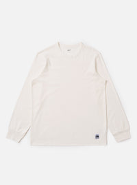 The Antique White Recycled/Bio Jersey Henry L/S Tee is shown as a flat lay against a white background. The long-sleeve T-shirt features a henley-style neckline with a three-button placket and ribbed cuffs. The fabric is a solid antique white jersey with a soft, matte finish.
