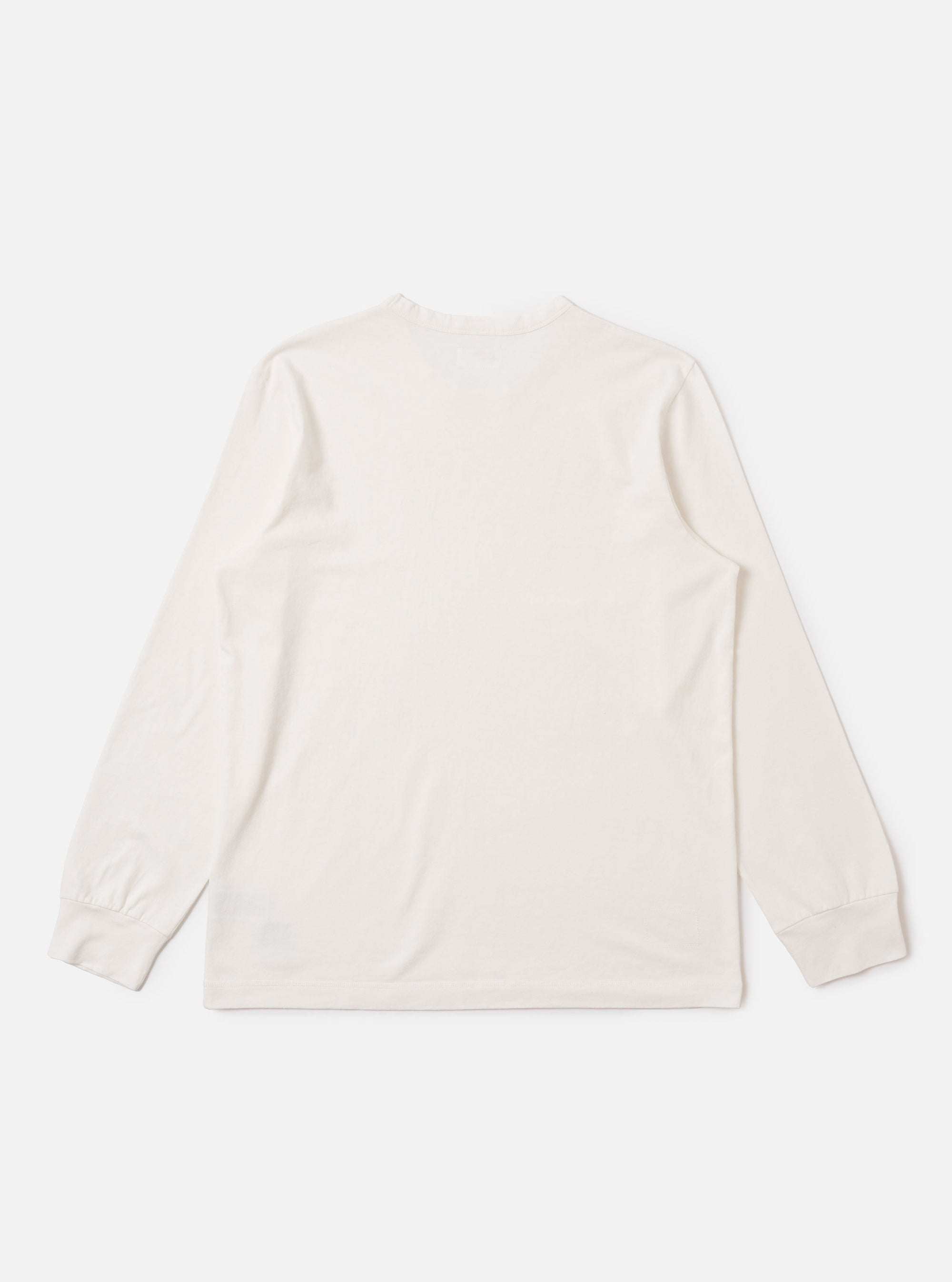 The Antique White Recycled/Bio Jersey Henry L/S Tee is shown from the back as a flat lay against a plain white background. The long-sleeved t-shirt features a clean, simple construction with a straight hem and ribbed cuffs. The garment is made from a soft, antique white jersey fabric.
