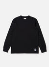 The Black Recycled/Bio Jersey Henry L/S Tee is presented as a flat lay against a plain white background. This long-sleeve t-shirt features a crew neckline, ribbed cuffs, and a straight hem. The garment is made from a solid black recycled and organic cotton jersey fabric.