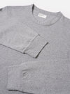 The Grey Marl Recycled/Bio Jersey Henry L/S Tee is shown from the back as a flat lay against a plain white background. The image highlights the clean construction of the long-sleeve t-shirt, featuring a simple straight hem and a classic crew neckline. The grey marl fabric has a soft, heathered texture.