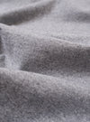 A close-up fabric swatch of the Grey Marl Recycled/Bio Jersey Henry L/S Tee highlights the speckled grey marl color and the soft, knitted texture of the recycled and organic cotton jersey fabric.