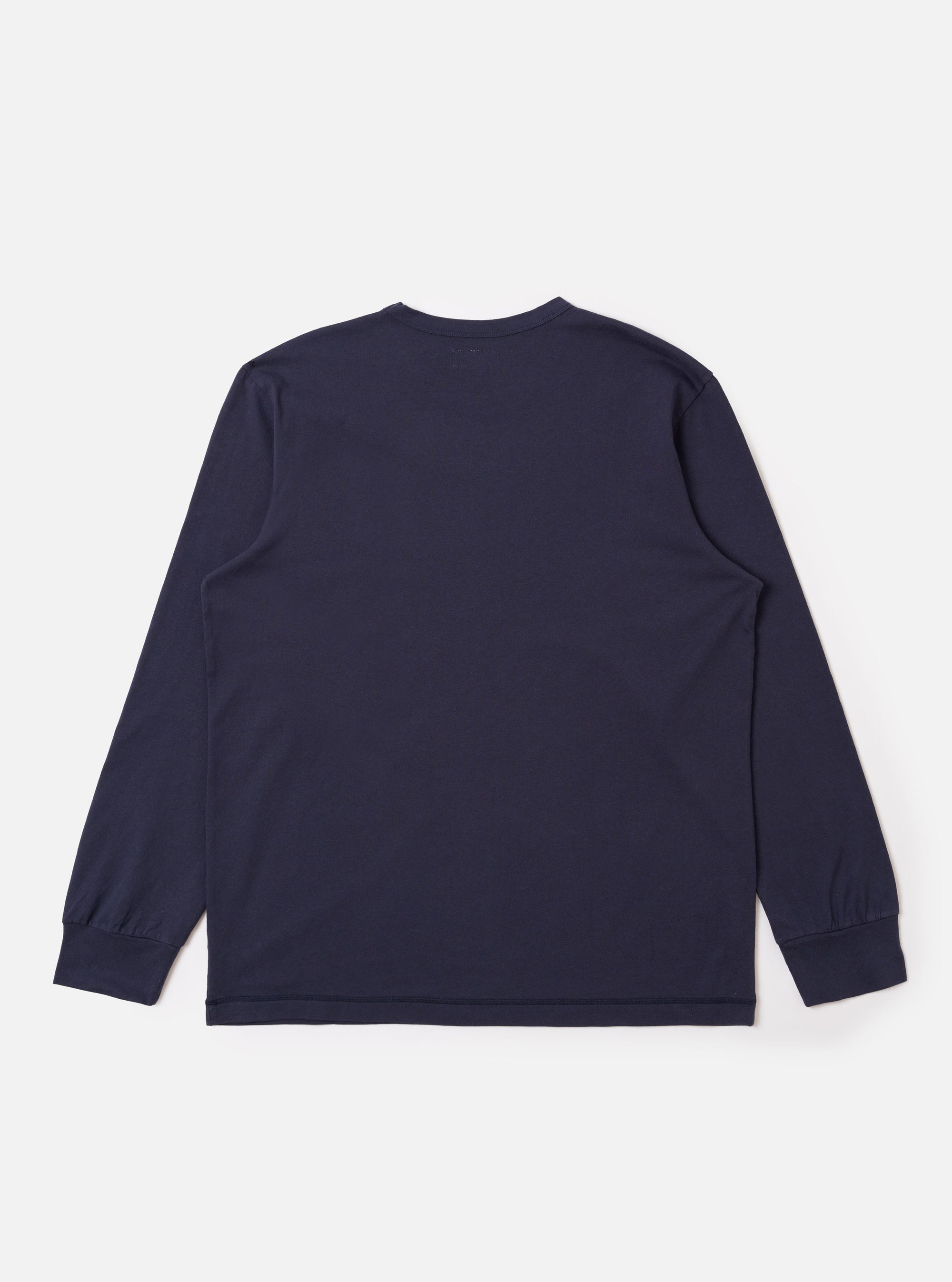 The Navy Recycled/Bio Jersey Henry L/S Tee is shown from the back as a flat lay against a plain white background. The image highlights the clean, simple construction of the garment's rear, including the crew neckline, long sleeves, and straight hem. The jersey fabric is a solid dark navy blue.