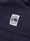 The Navy Recycled/Bio Jersey Henry L/S Tee is shown from the back as a flat lay against a plain white background. The long-sleeve t-shirt features a ribbed crew neckline and a straight hem. The dark navy blue jersey fabric has a smooth, uniform appearance.