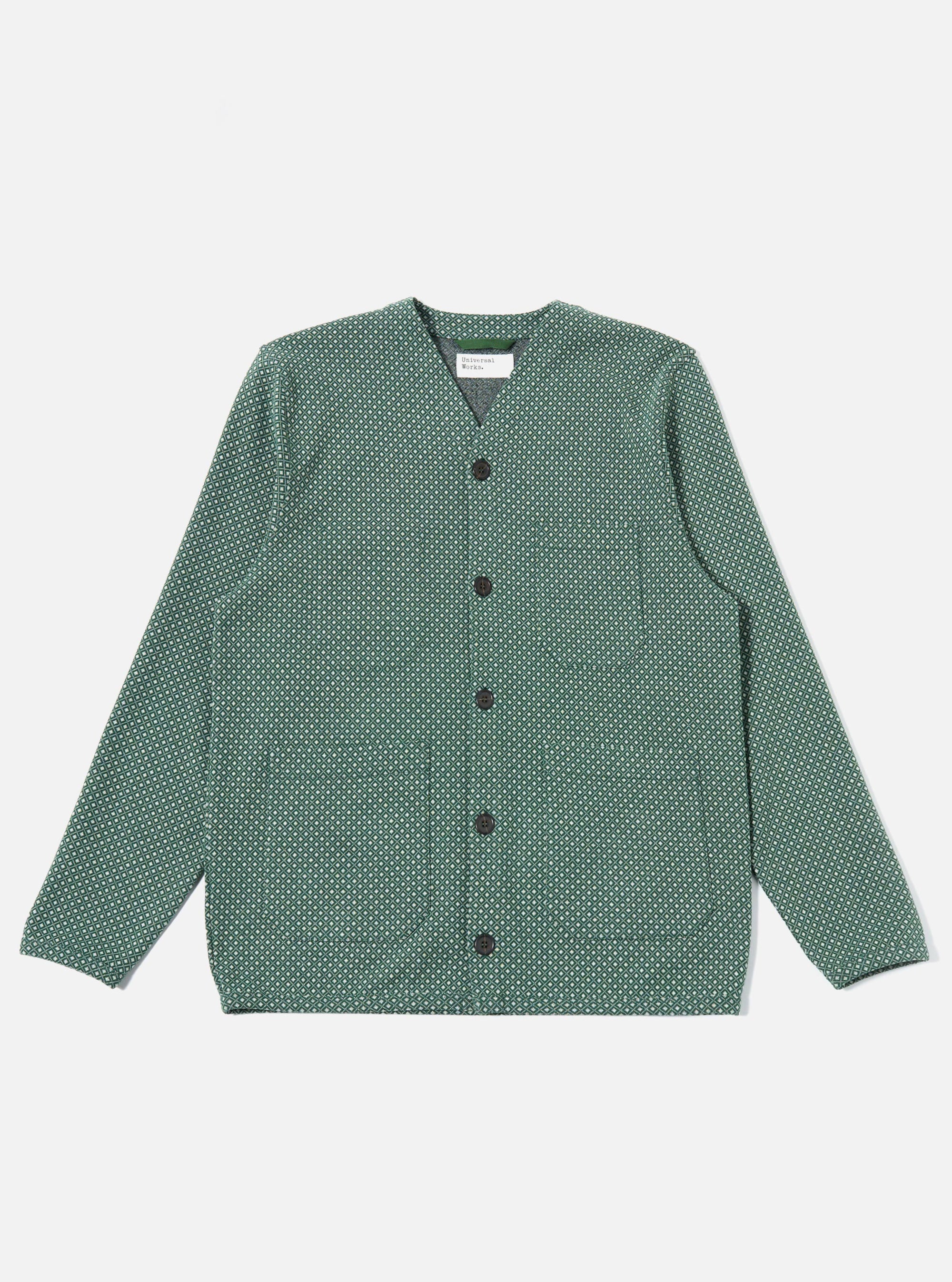 The Green Argyll Jersey Cardigan is shown as a flat lay against a plain white background. The garment features an all-over argyle pattern in shades of green and dark tones, a V-neckline, and a five-button front closure. The sleeve cuffs and hem are finished with a solid green ribbed trim.