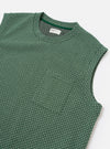The Green Argyll Jersey Sleeveless Crew is shown from the back as a flat lay against a plain white background. The image highlights the garment's all-over green argyll diamond pattern, a ribbed crew neckline, and a sleeveless design with a straight hem.