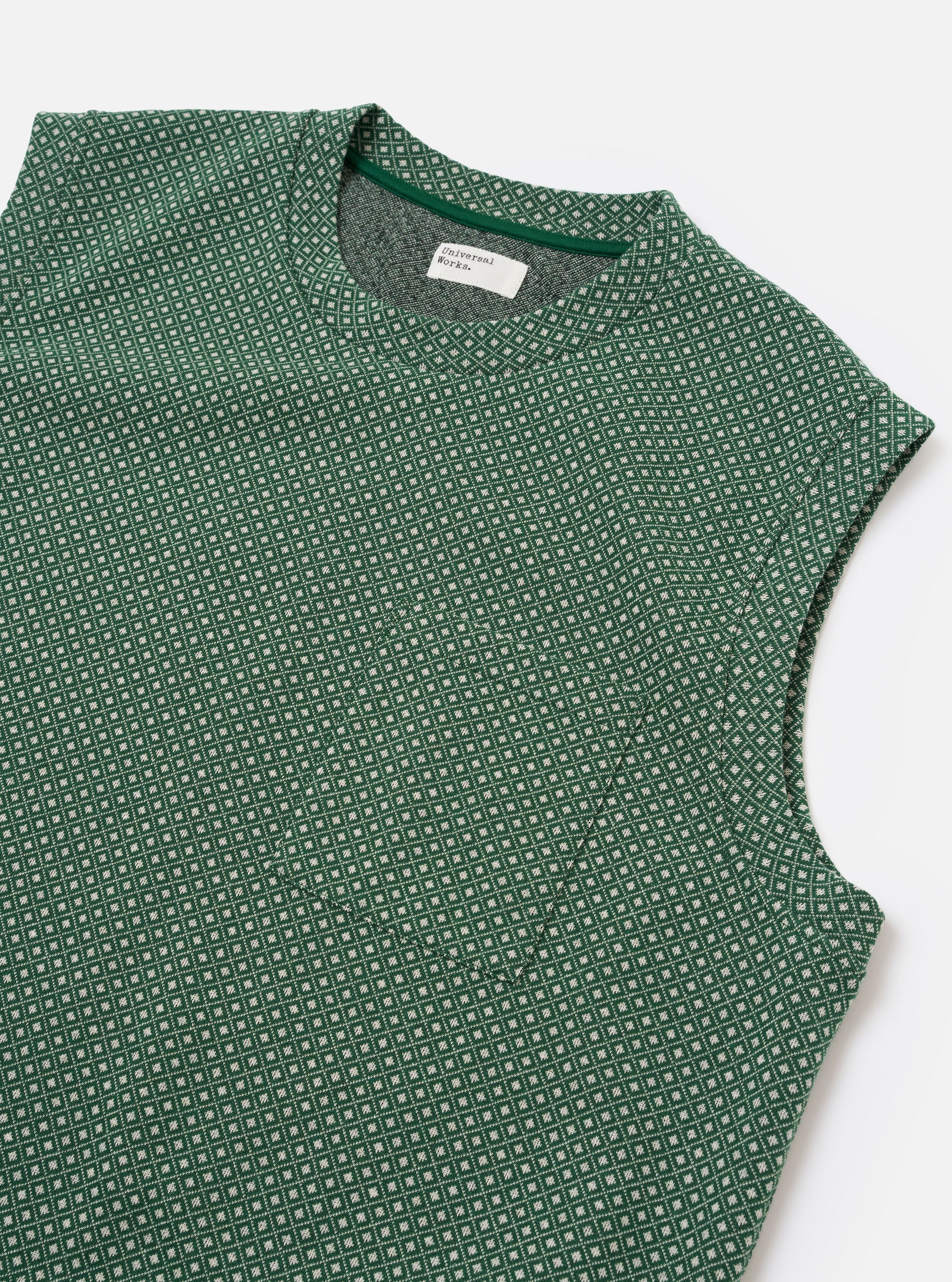 The Green Argyll Jersey Sleeveless Crew is shown from the back as a flat lay against a plain white background. The image highlights the garment's all-over green argyll diamond pattern, a ribbed crew neckline, and a sleeveless design with a straight hem.