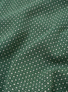 The Green Argyll Jersey Sleeveless Crew is shown from the back as a flat lay against a plain white background. The image highlights the garment's sleeveless design, ribbed crew neckline, and straight hem. The fabric features a prominent green argyll diamond pattern.