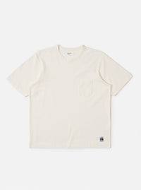 The Antique White Recycled/Bio Jersey Core Pocket Tee is shown as a flat lay against a plain white background. The T-shirt features a classic crew neckline, short sleeves, and a single patch pocket on the left chest. The fabric is a solid antique white jersey with a smooth texture.